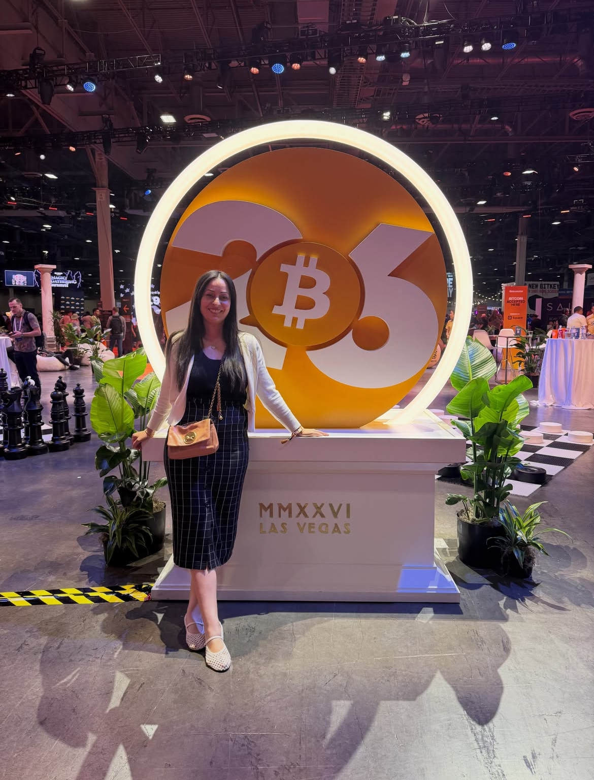 Attendee standing next to the Bitcoin 2026 Las Vegas installation